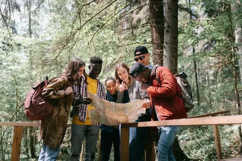 Friends exploring with a map